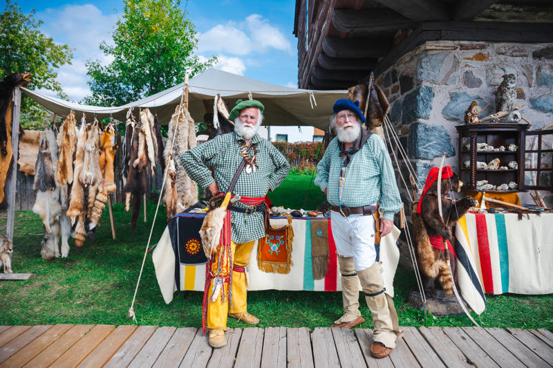 Men wearing voyageur style clothing