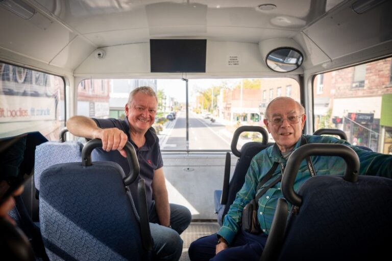 Two men and a bus
