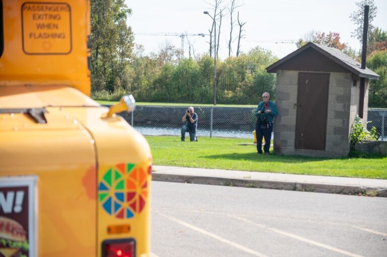 Two men and a bus